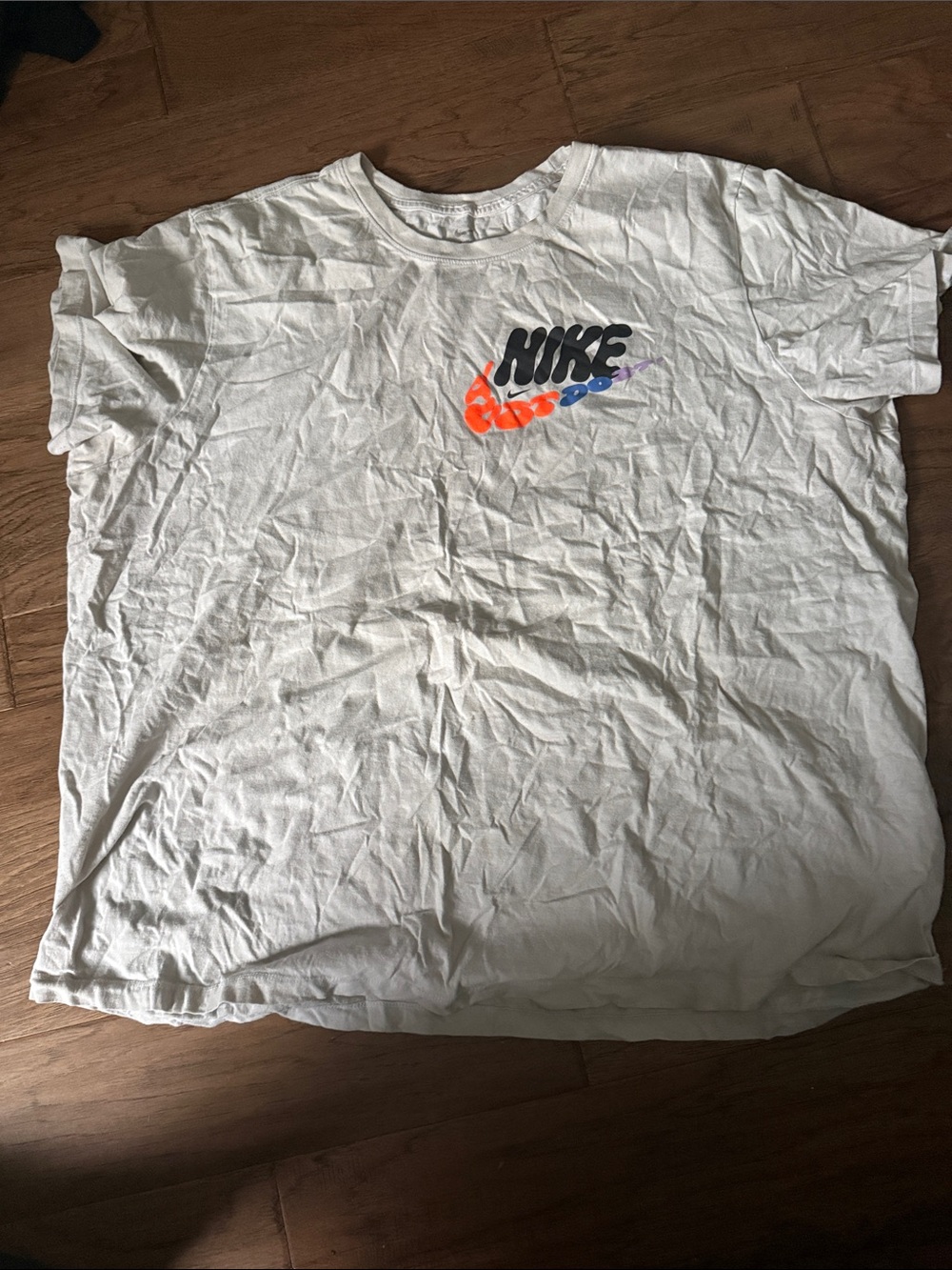 Nike Men's White Short Sleeve Tee with Multicolor Logo